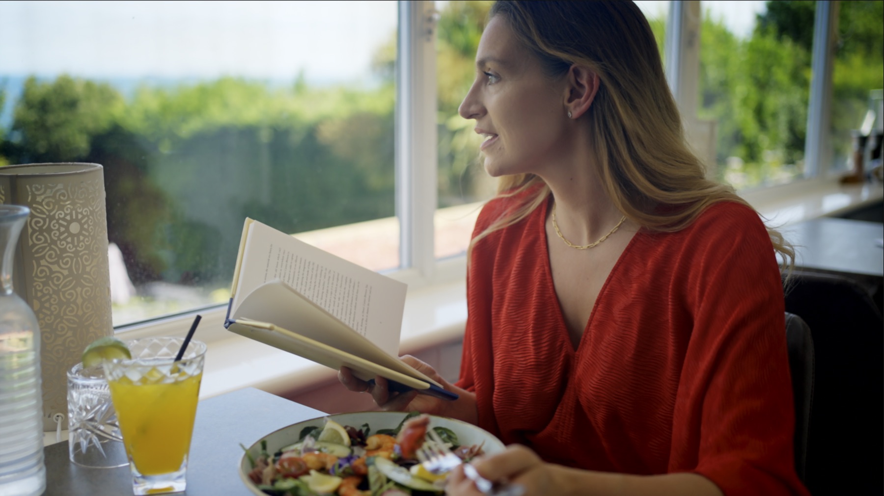 Dining with sea views at Revive — a still from the hotel film